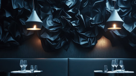 A sophisticated restaurant interior featuring a textured black wall and modern pendant lights, creating an elegant dining atmosphere perfect for fine dining.の素材