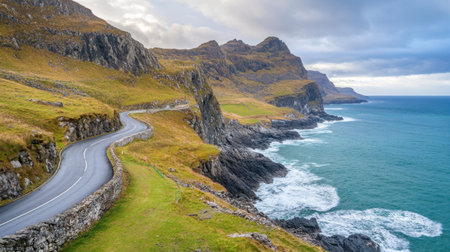 Immerse yourself in this breathtaking coastal scene featuring a winding road alongside dramatic cliffs and vibrant turquoise waters, perfect for travel enthusiasts.の素材