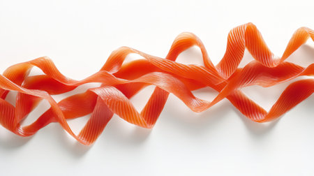Capture the essence of culinary art with these vibrant salmon ribbon strands, showcasing unique texture and color, perfect for gourmet cuisine presentation.の素材