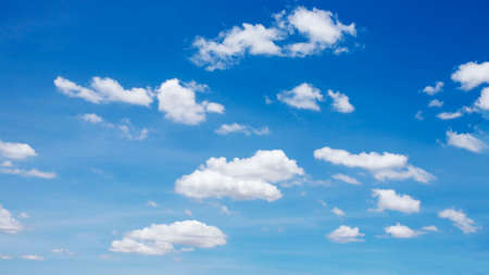 Many blurred white clouds on the beautiful blue sky for use as a background image.の写真素材