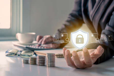 Logo icon immune system protecting documents in the hands of business people financial document...