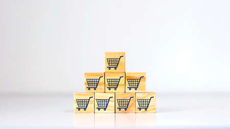 Stacked wooden blocks and sales icons and marketing ideas.