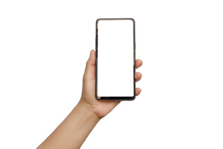 The hand is holding the white screen, the mobile phone is isolated on a white background with the clipping path.の写真素材
