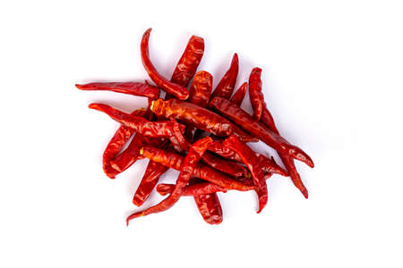 Dried red chilies or red chili peppers isolated on white background.の写真素材