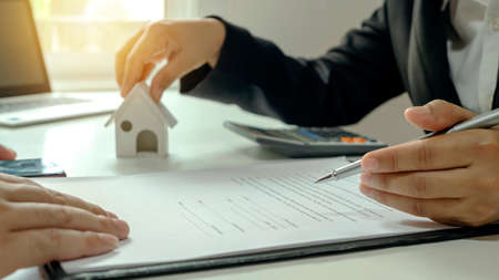 The client is in talks to sign a real estate contract with an approved mortgage request form. Home Loan and Home Loan Ideas.の写真素材