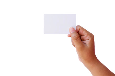 Man holding business card isolated on white background with clipping path.の写真素材