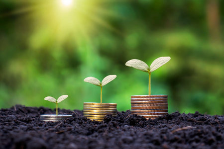 Growing money and plants on coins. Finance and investment concept.