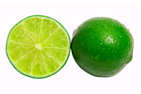 Healthy citrus fruity food. Whole and Slice of fresh lime isolated on white backgroundの写真素材