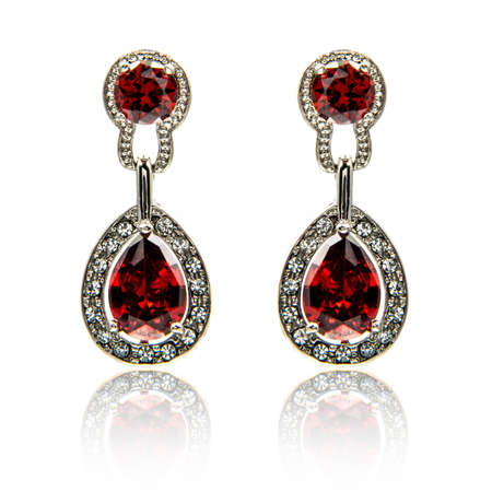 Pair of ruby diamond earrings isolated on white backgroundの写真素材