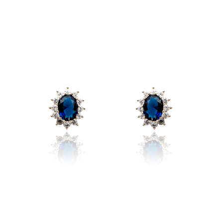Pair of sapphire earrings isolated on white backgroundの写真素材