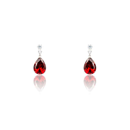Pair of ruby diamond earrings isolated on white backgroundの写真素材