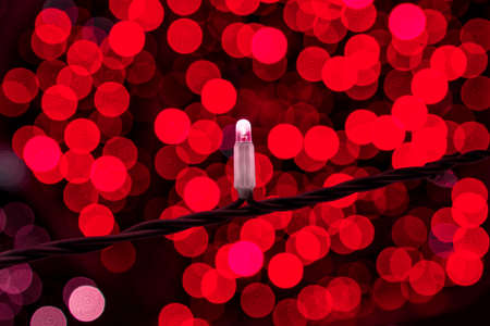Close up of red Garland lamp on bokeh background.の写真素材