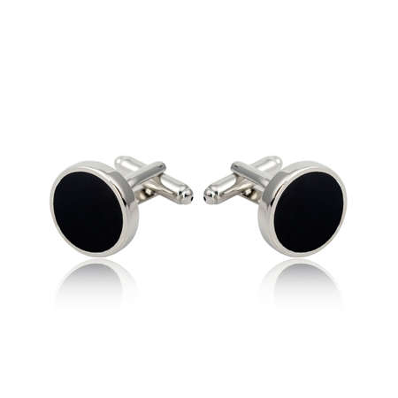 Silver cuff links on white background