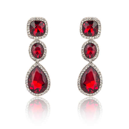 Pair of ruby diamond earrings isolated on white backgroundの写真素材