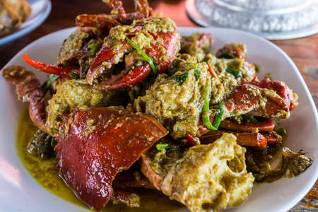 Fried crab in yellow  curry.の写真素材