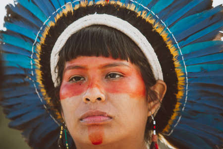TupinambÃ¡ Indian woman portrait with headdress in the ancestral cry TupinambÃ¡ river TapajÃ³s Amazonのeditorial素材