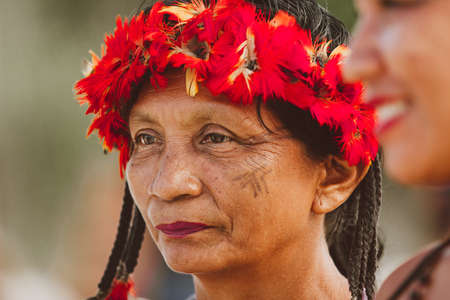 TupinambÃ¡ Indian woman portrait with headdress in the ancestral cry TupinambÃ¡ river TapajÃ³s Amazonのeditorial素材