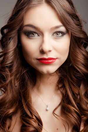 Portrait of beautiful woman posing in studioの写真素材