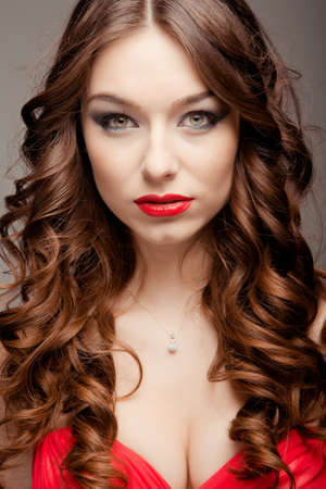 Portrait of beautiful woman posing in studioの写真素材