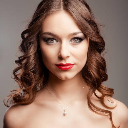 Portrait of beautiful woman posing in studioの写真素材