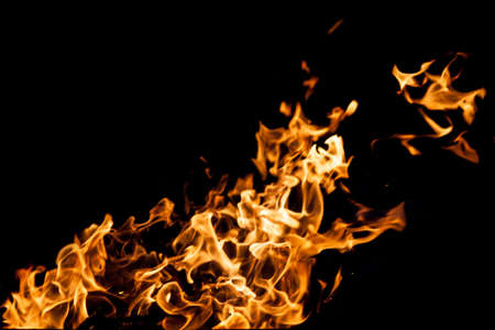 Fire flames on black backgroundの写真素材