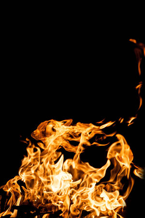 Fire flames on black backgroundの写真素材