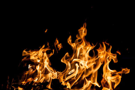 Fire flames on black backgroundの写真素材