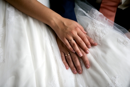 Bride and groom handsの写真素材