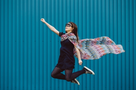 Girl in black superhero maskの写真素材