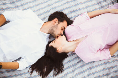 Happy and young pregnant coupleの写真素材