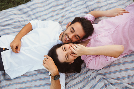 Happy and young pregnant coupleの写真素材