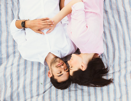 Happy and young pregnant coupleの写真素材