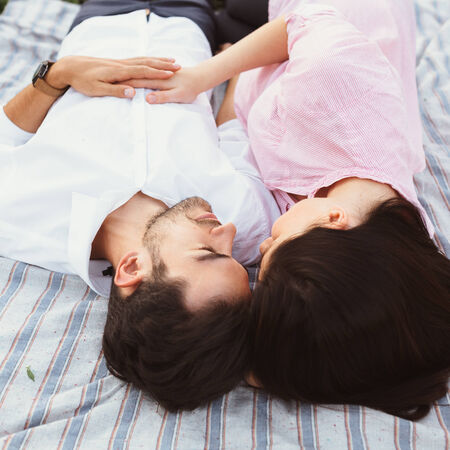 Happy and young pregnant coupleの写真素材