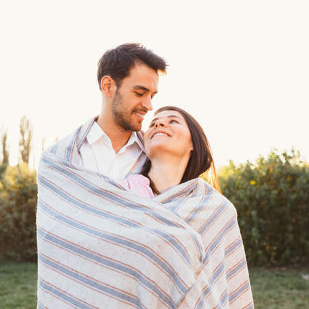 Happy and young pregnant coupleの写真素材