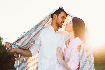 Happy and young pregnant coupleの写真素材