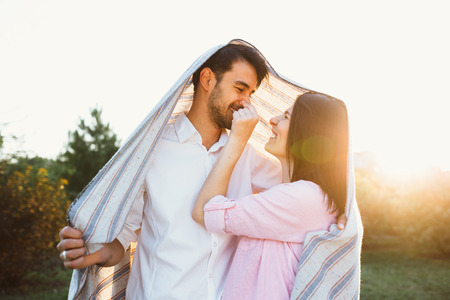 Happy and young pregnant coupleの写真素材