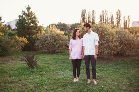 Happy and young pregnant coupleの写真素材
