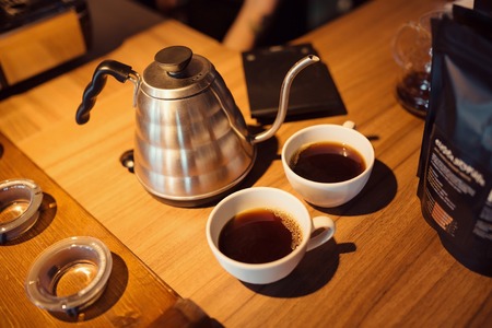 Barista at work in a coffee shop. Preparation service conceptの写真素材