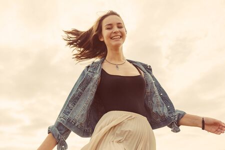 Young and handsome girl have fun outdoorsの写真素材