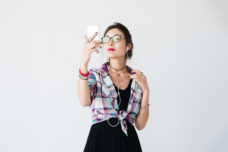 Pretty girl taking selfieの写真素材