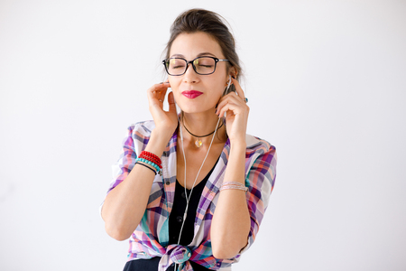 Colorful smiling woman in fashion glassesの写真素材