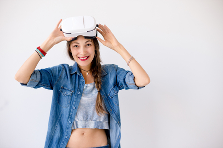 Young woman experiencing VR technologyの写真素材