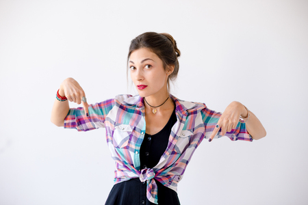Portrait of a smiling wide young womanの写真素材