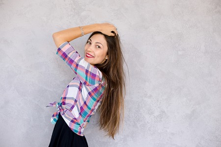 Attractive woman looking over her shoulder