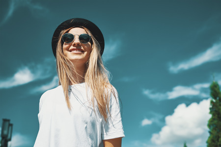 Happy young woman enjoying vacationの写真素材