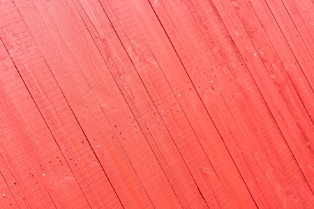 Red wood background. Painted wooden wallの写真素材