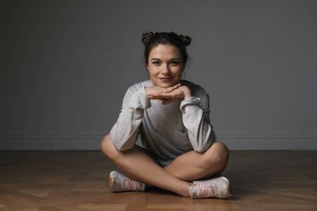 Portrait of young woman with perfect skin and natural make upの写真素材