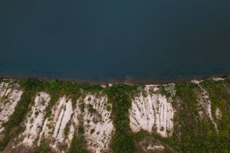 Aerial view of the picturesque landscape of coast washed by water. Beautiful touristic destination