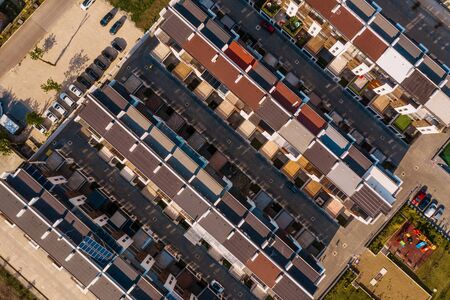 Top down aerial view of urban town houses in a residential areaの写真素材