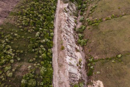 Aerial top view of rocks and tree, mountain ecosystem and healthy environment concept and background, Texture of green tree, stones and landの写真素材